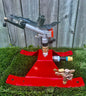 Big Red Sprinkler Sled w/ Yuzuak Atom 23 1" adj impact sprinkler pasture arena dust turf 120ft diameter